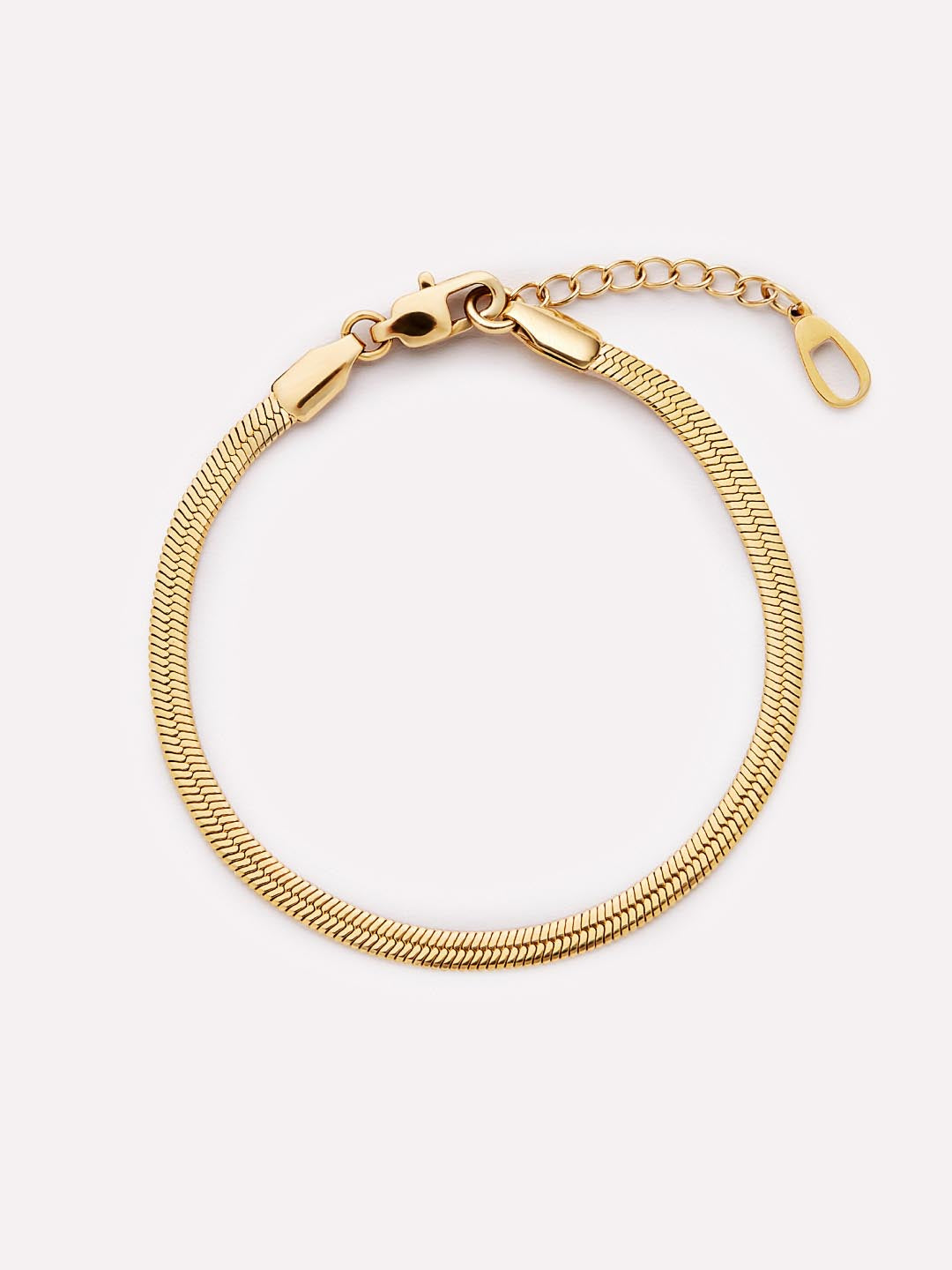 Gold bracelet on a white background
