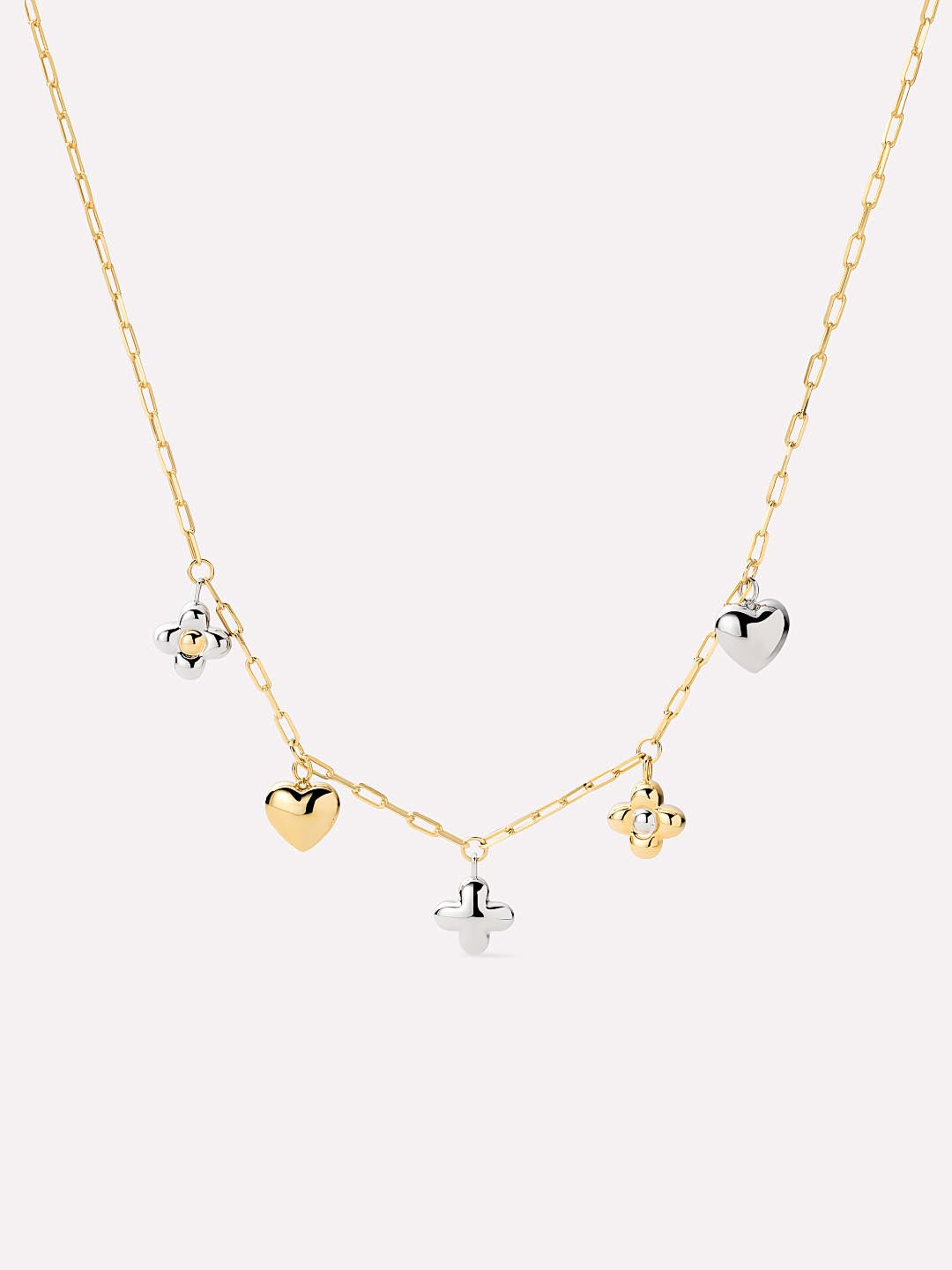 Gold necklace with heart-shaped charms on a white background
