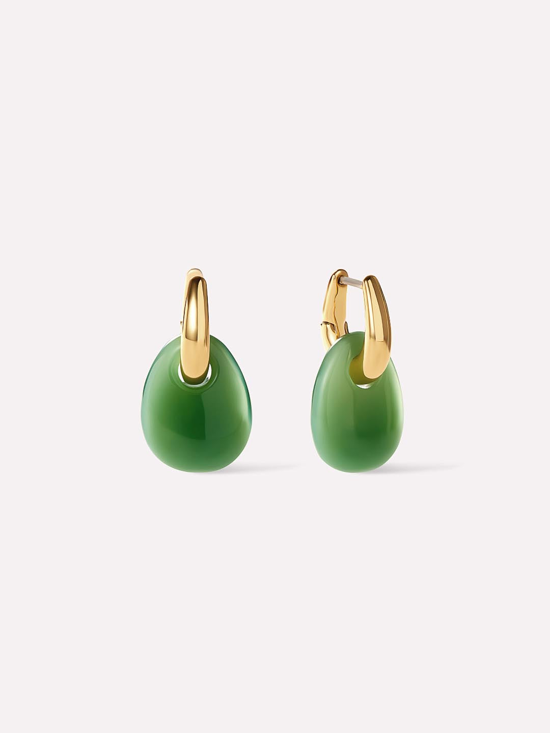 Pair of green earrings with gold hooks on a white background