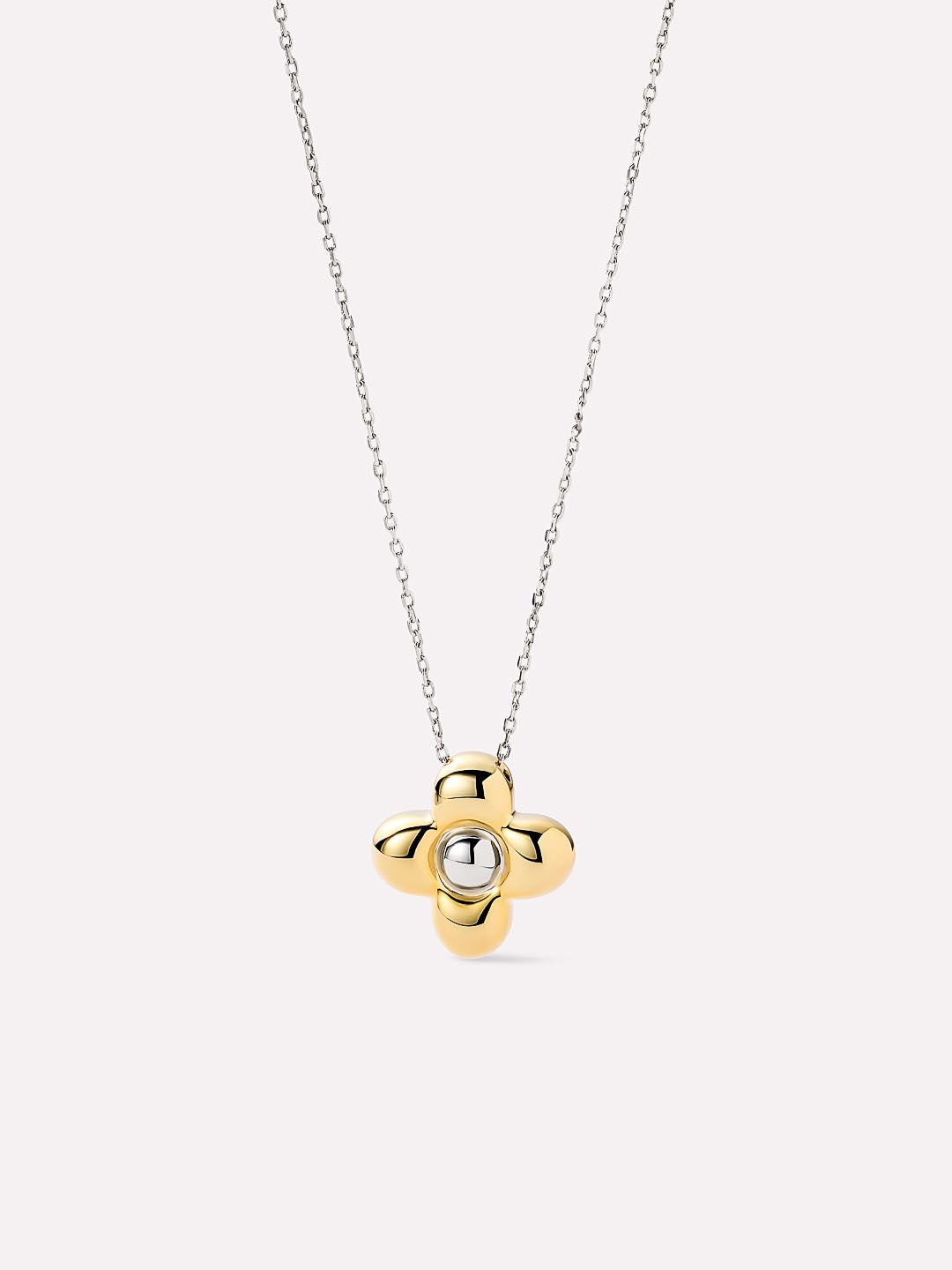 Gold and silver necklace with a pendant on a white background