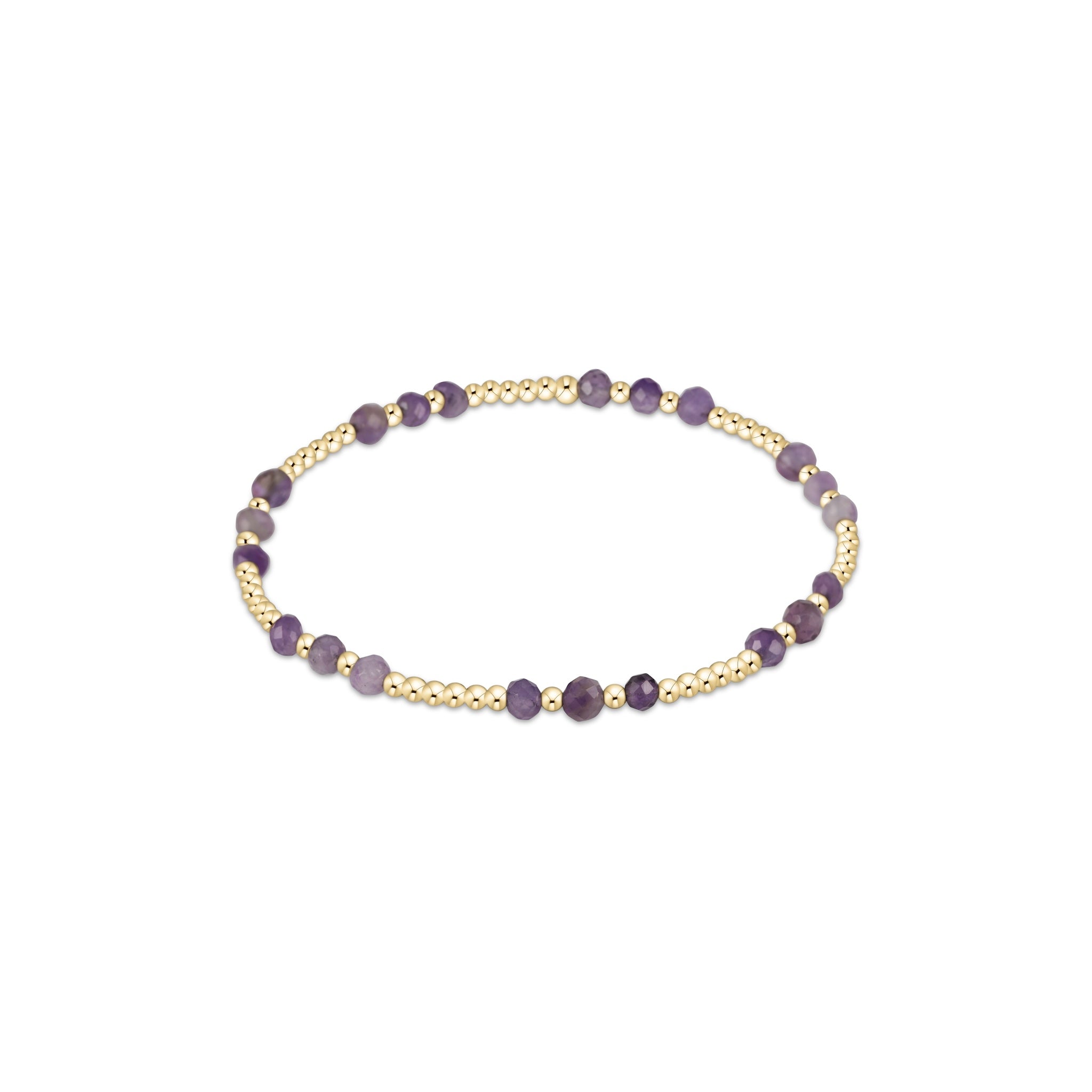 Bracelet with purple beads on a gold band against a white background