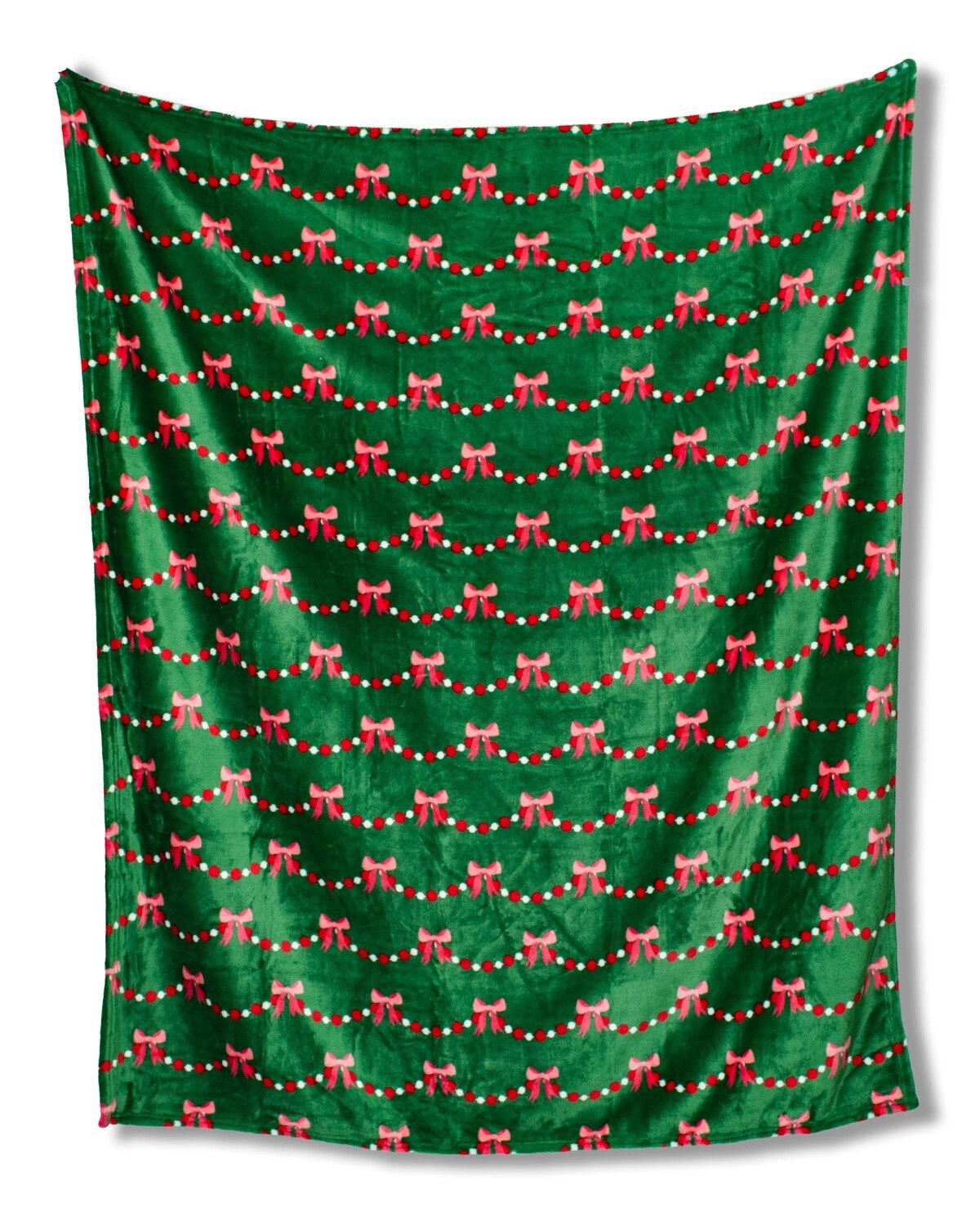 Green fabric with red bow and string pattern on a white background