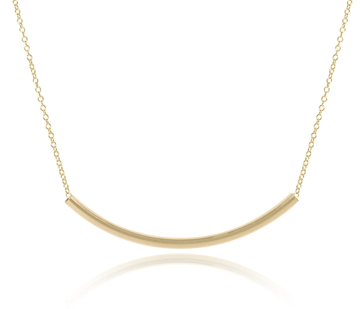 Gold necklace with a curved pendant on a white background