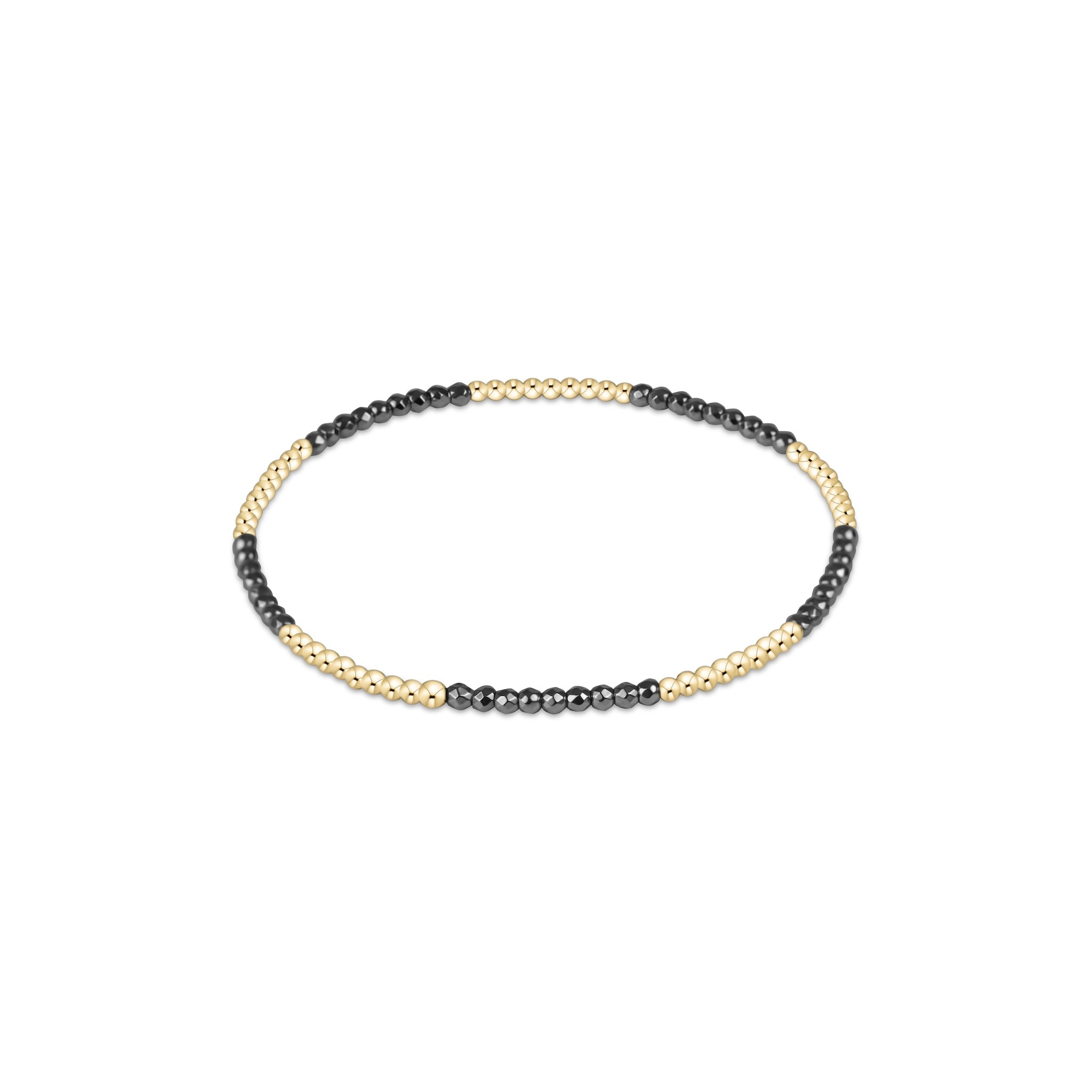 Beaded bracelet with black and gold beads on a white background