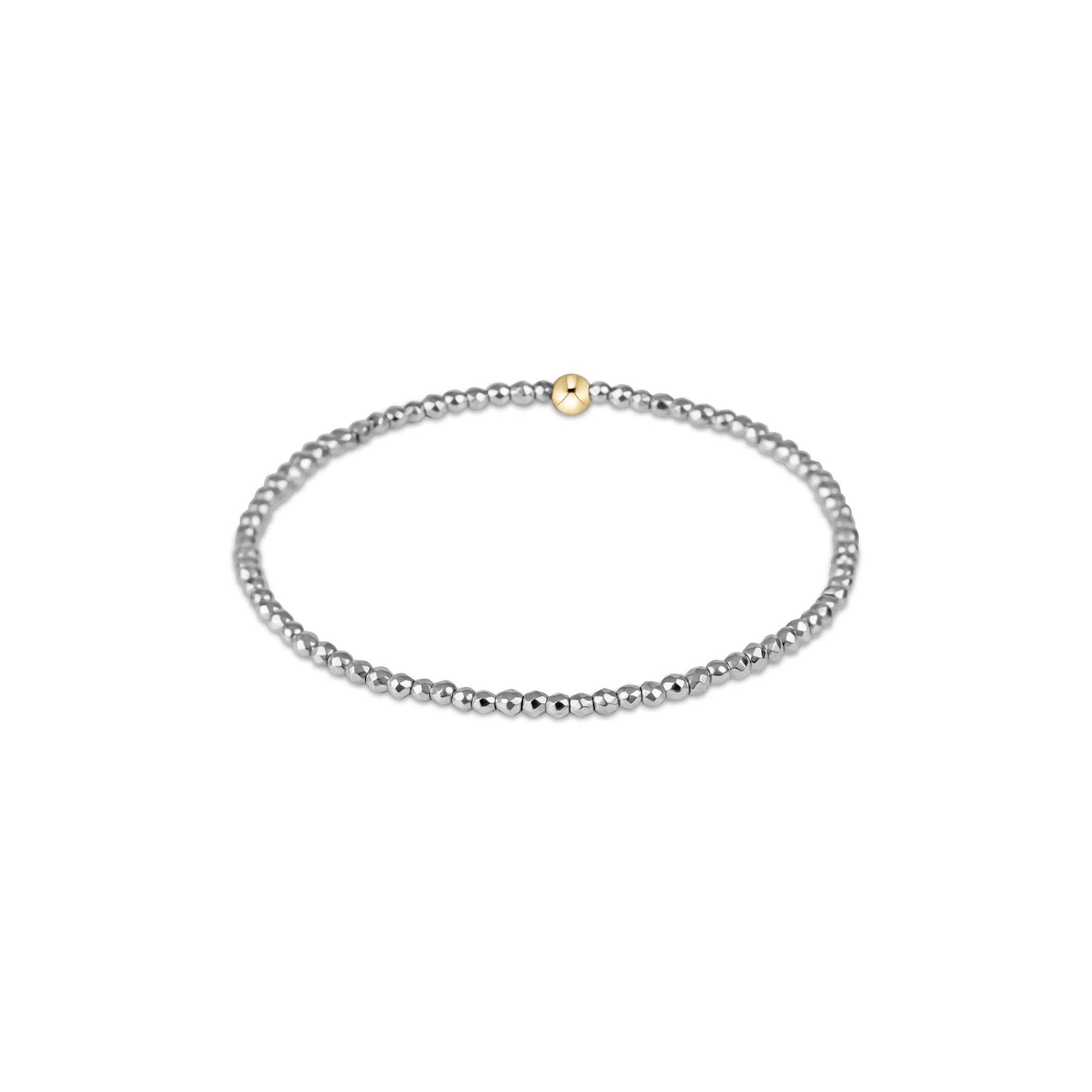 Silver beaded bracelet with a gold clasp on a white background