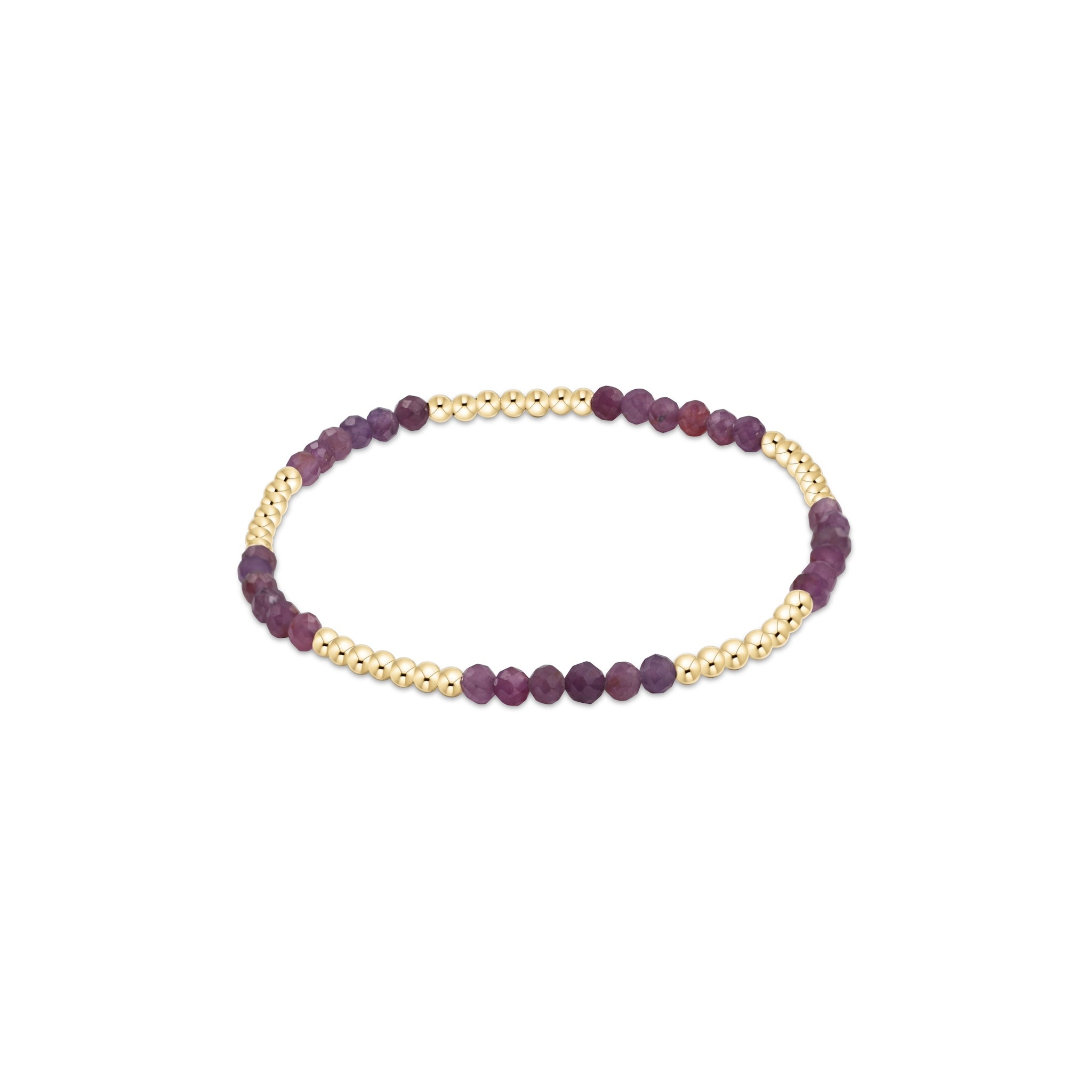 Bracelet with purple beads and gold accents on a white background
