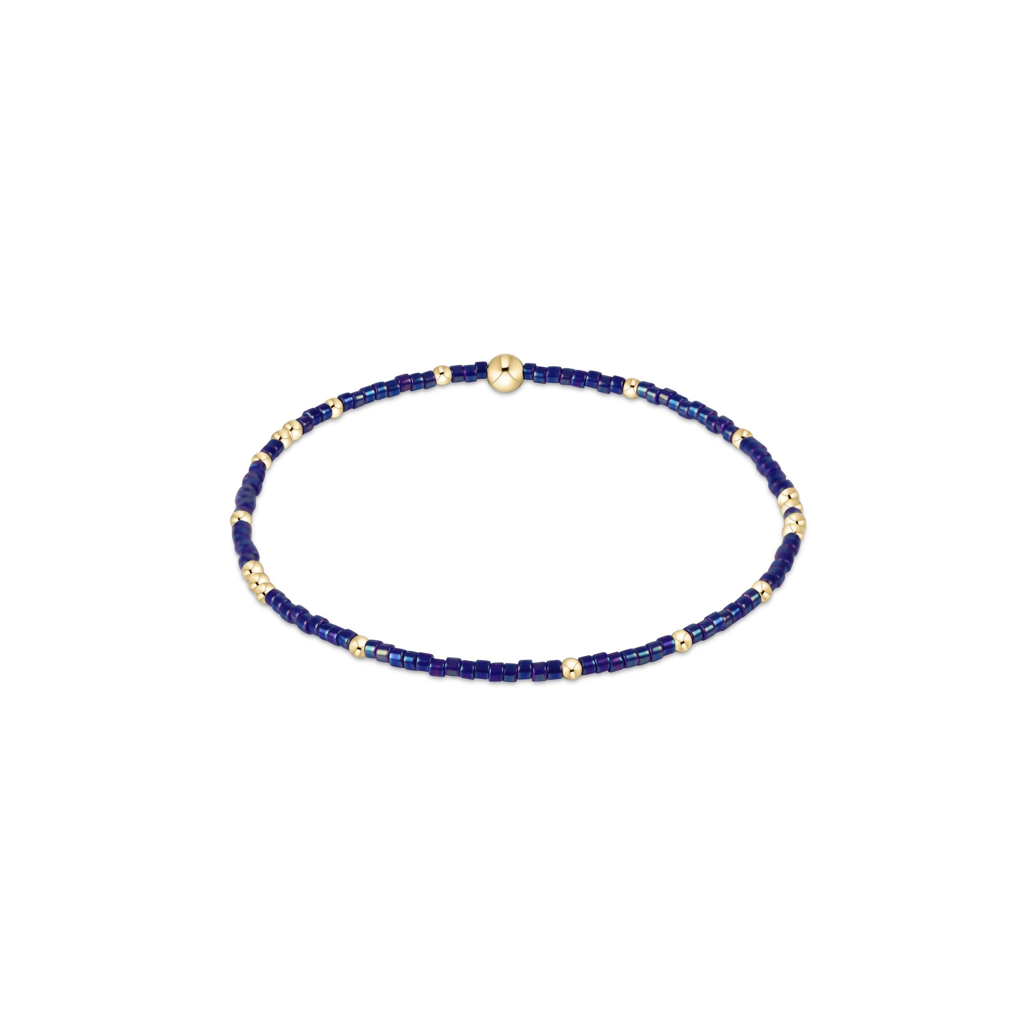 Navy blue beaded bracelet with gold accents on a white background