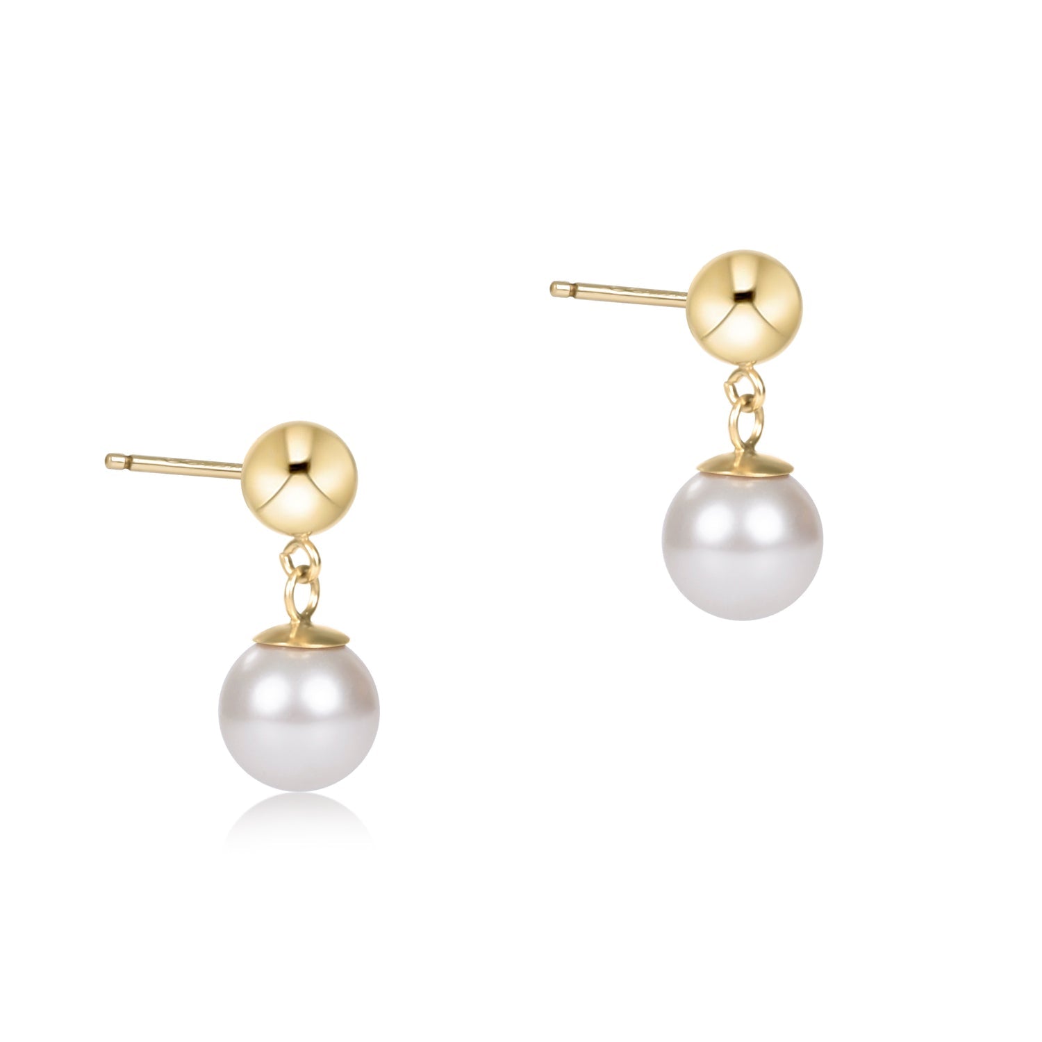 Pair of pearl earrings with gold posts on a white background