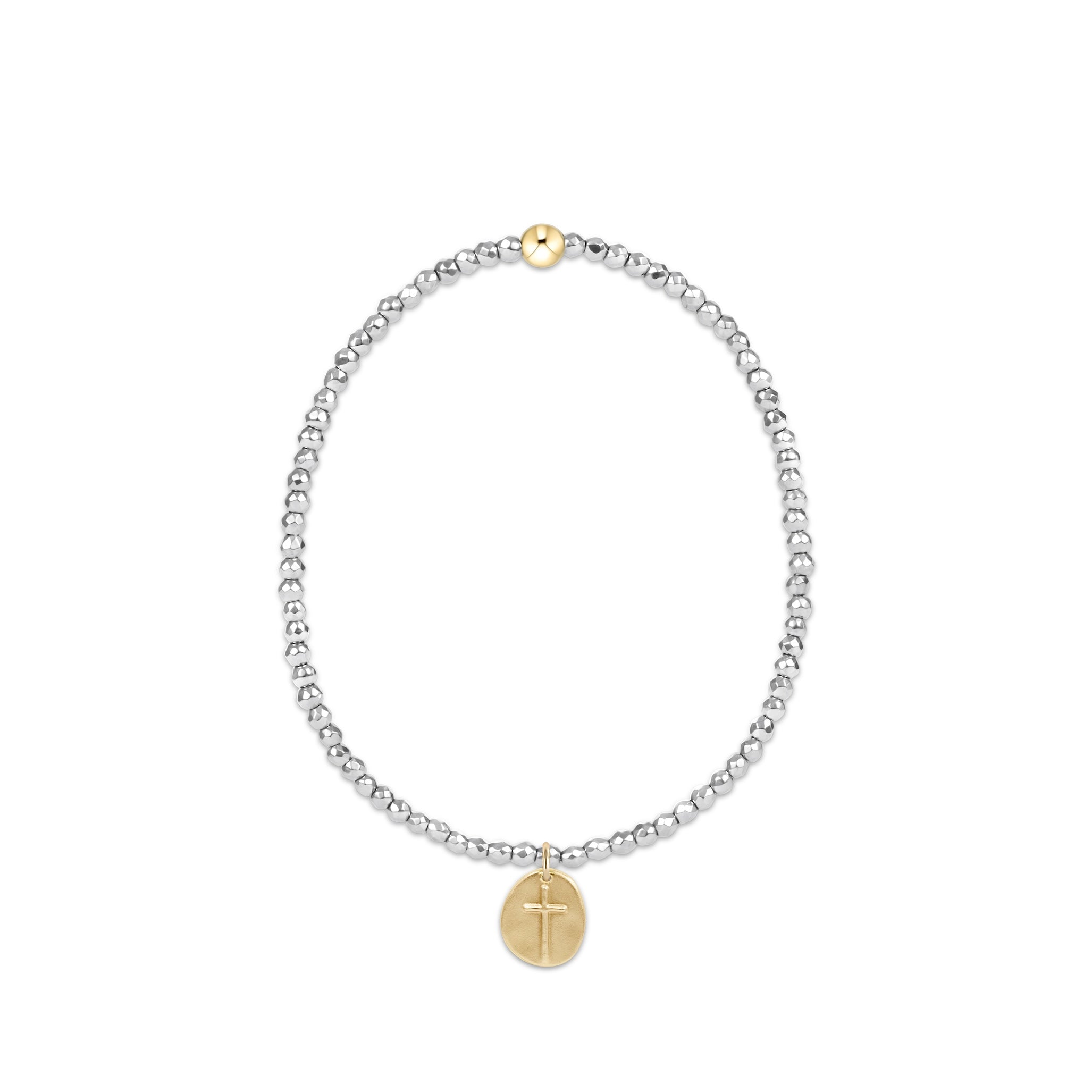 Silver beaded bracelet with a gold cross charm on a white background