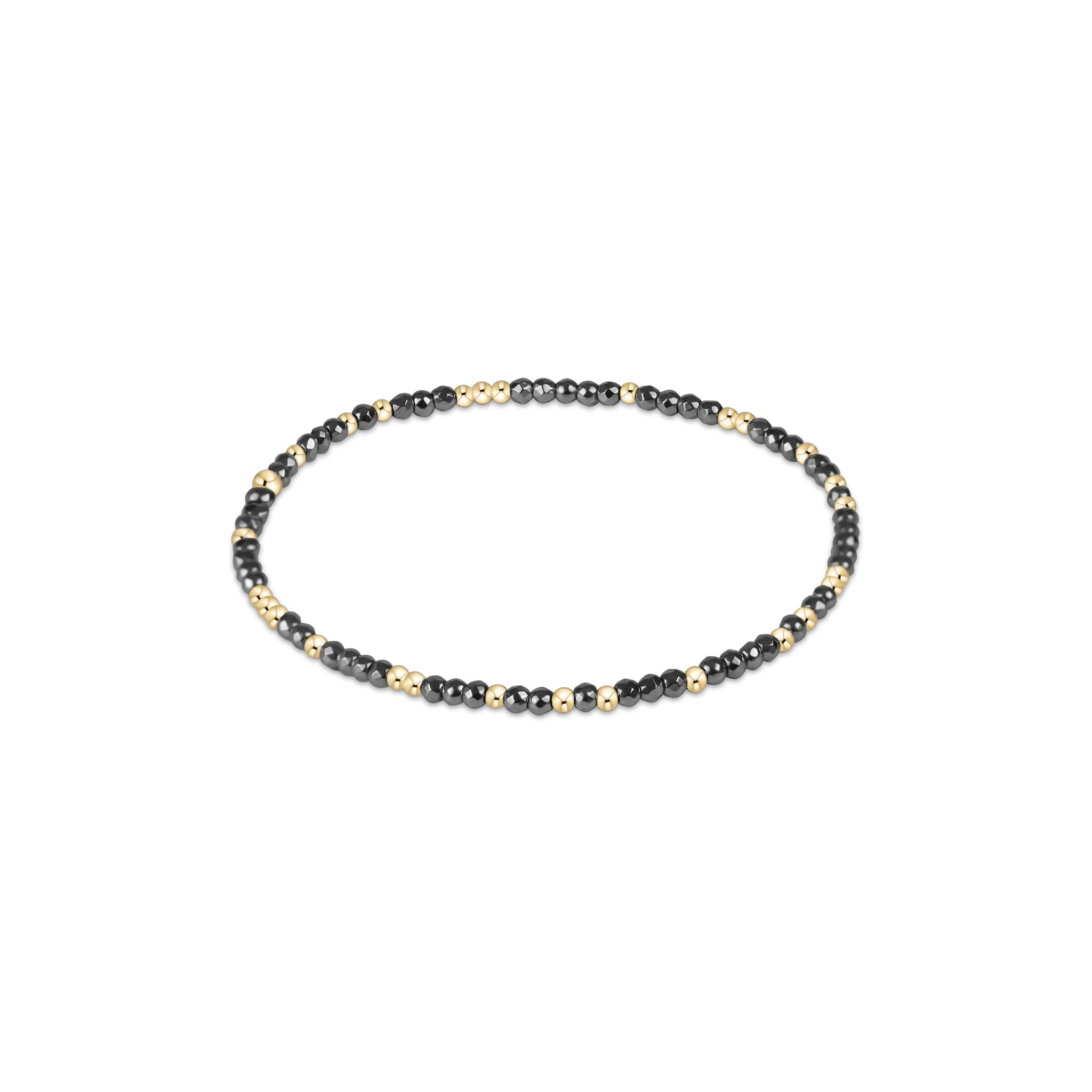 Beaded bracelet with black and gold beads on a white background