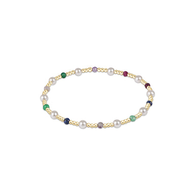 Bracelet with pearls and multicolored beads on a white background