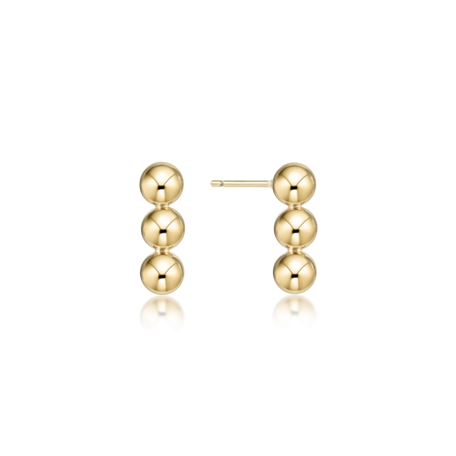 Pair of gold earrings on a white background