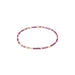 bracelet with pink and gold beads on a white background