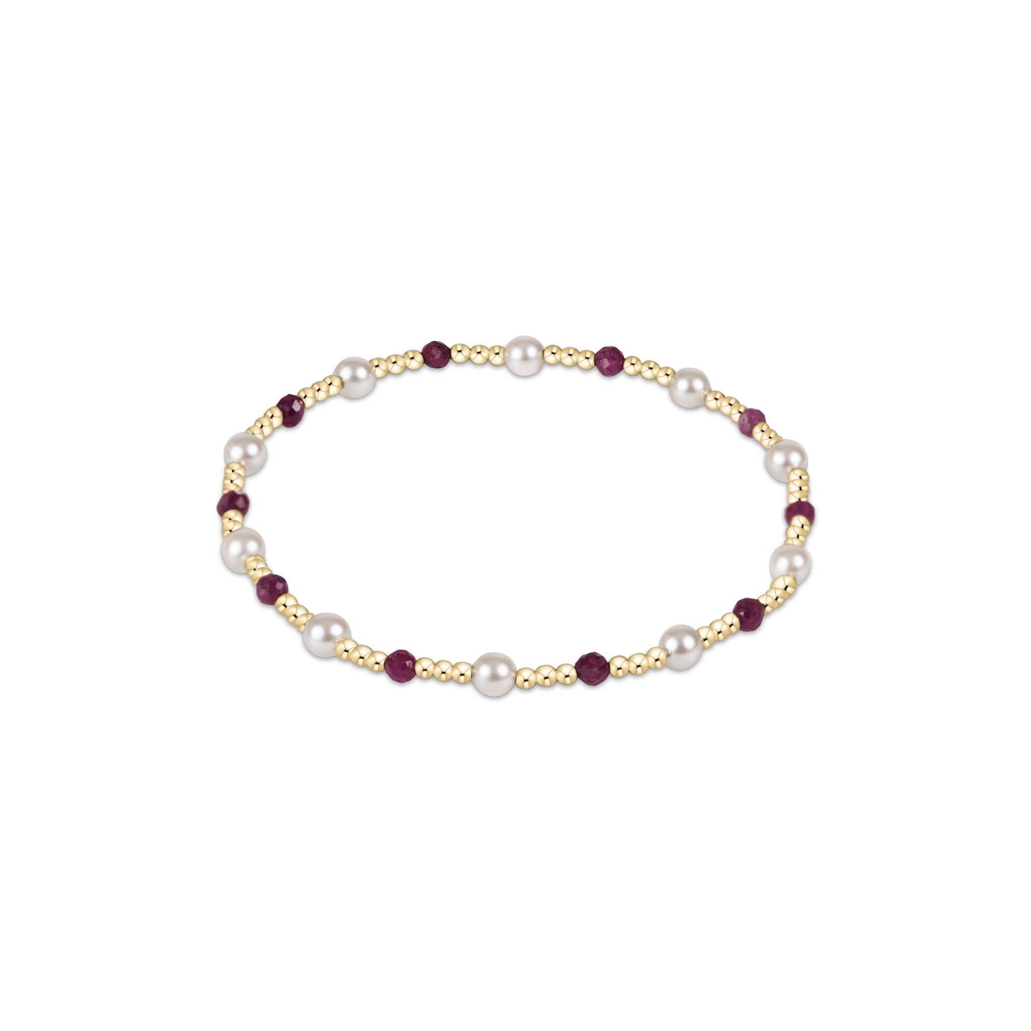 Bracelet with pearls and red gemstones on a white background