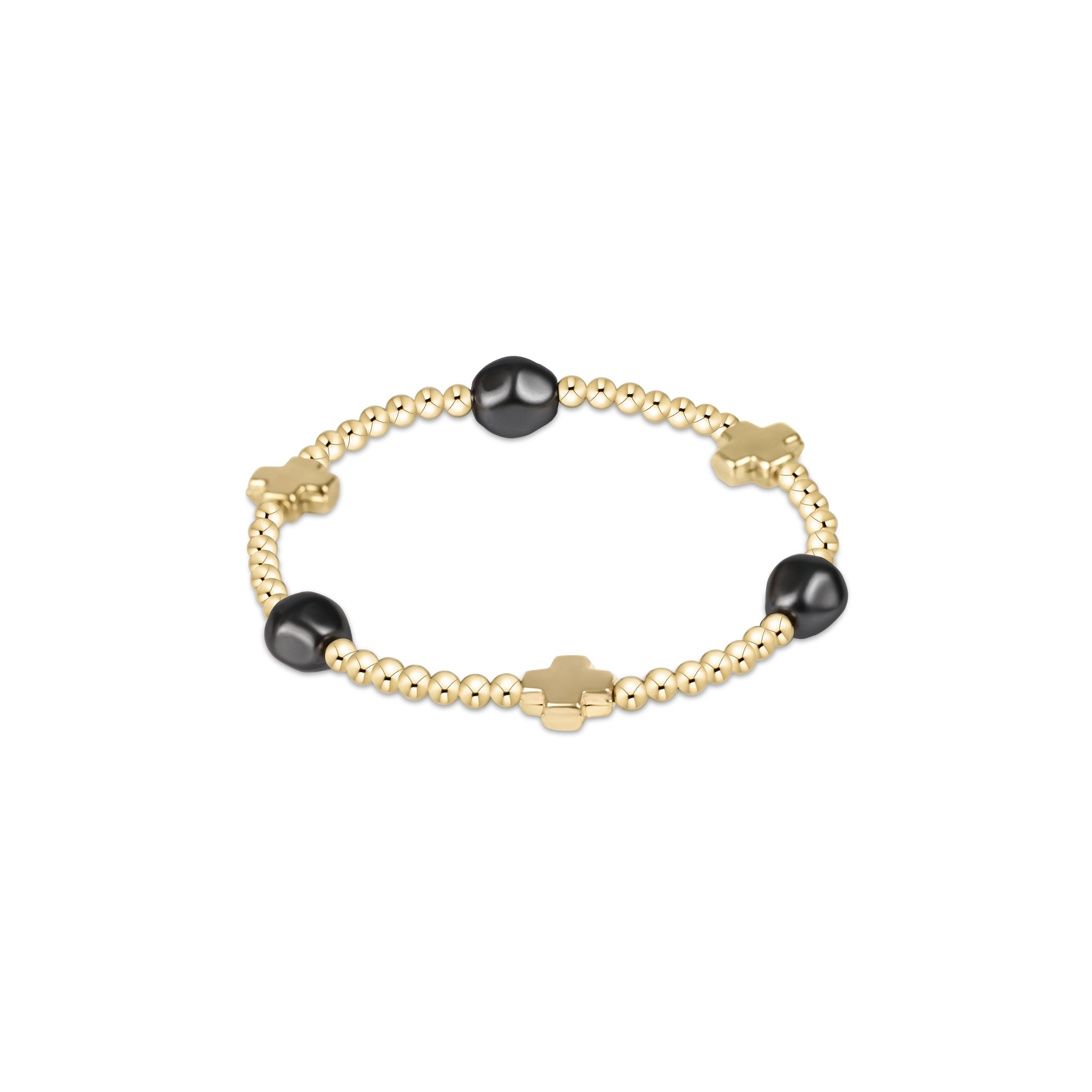 Gold bracelet with black beads on a white background