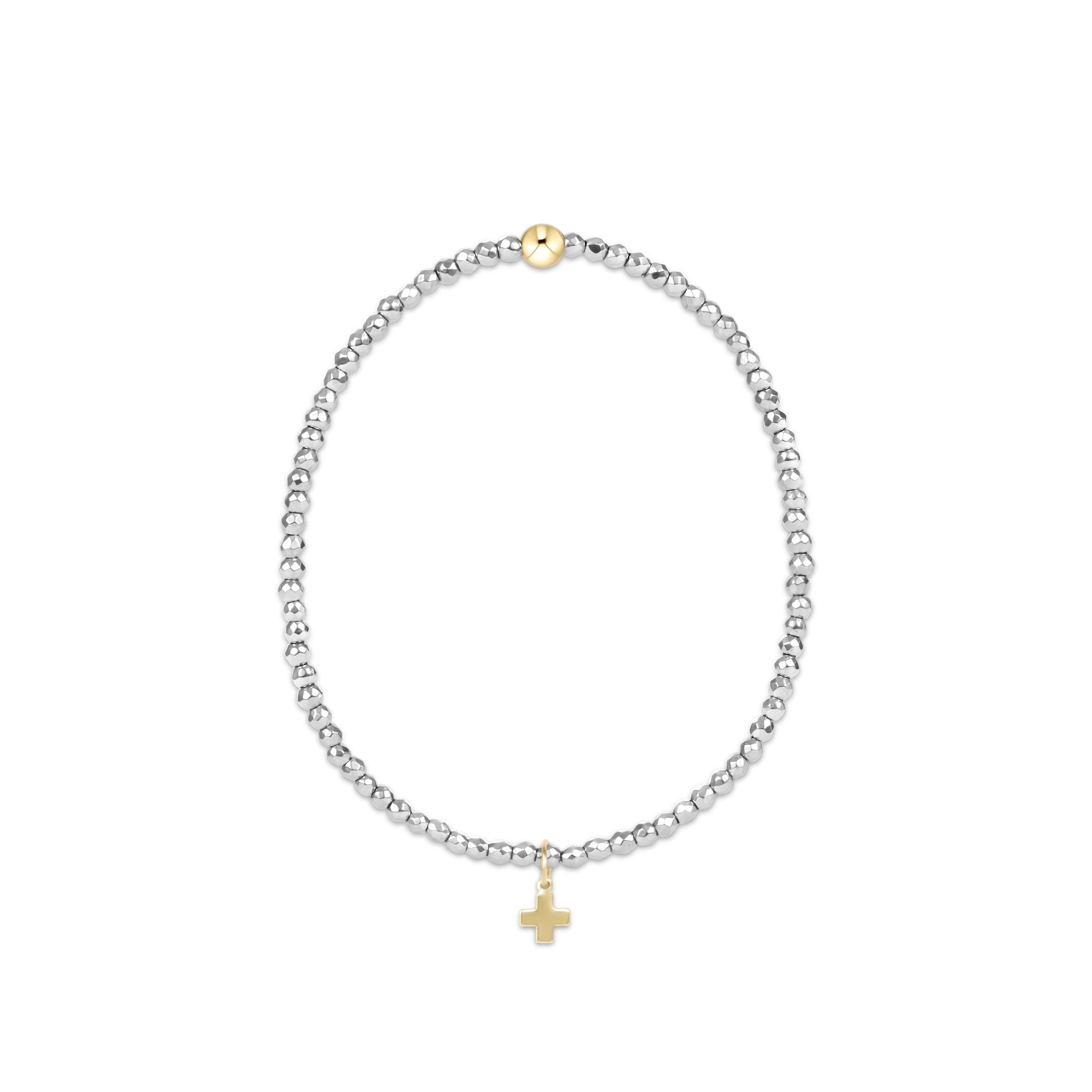 Silver beaded bracelet with a gold cross charm on a white background