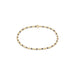 Gold and black beaded necklace on a white background