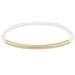Pearl bracelet with a gold accent on a white background