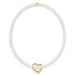 Pearl necklace with a gold heart-shaped clasp on a white background