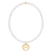 Pearl necklace with a gold paw print charm on a white background