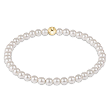 Pearl bracelet with a gold clasp on a white background