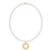 Pearl bracelet with a gold heart charm on a black background