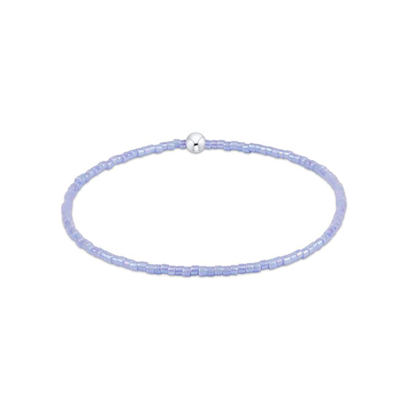 Lavender beaded bracelet with a silver clasp on a white background