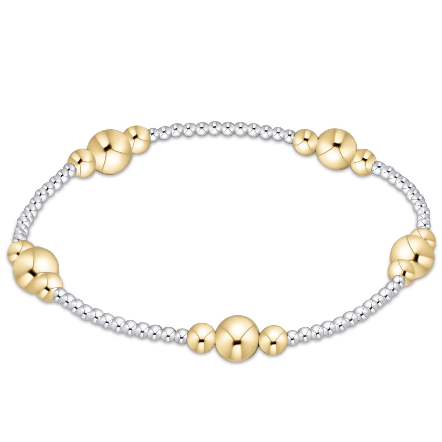 Gold and silver beaded bracelet on a white background
