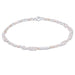 Pearl bracelet with silver beads on a white background