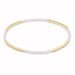 Bracelet with gold beads on a white background