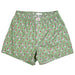 Green boxer briefs with Santa Claus pattern on a white background