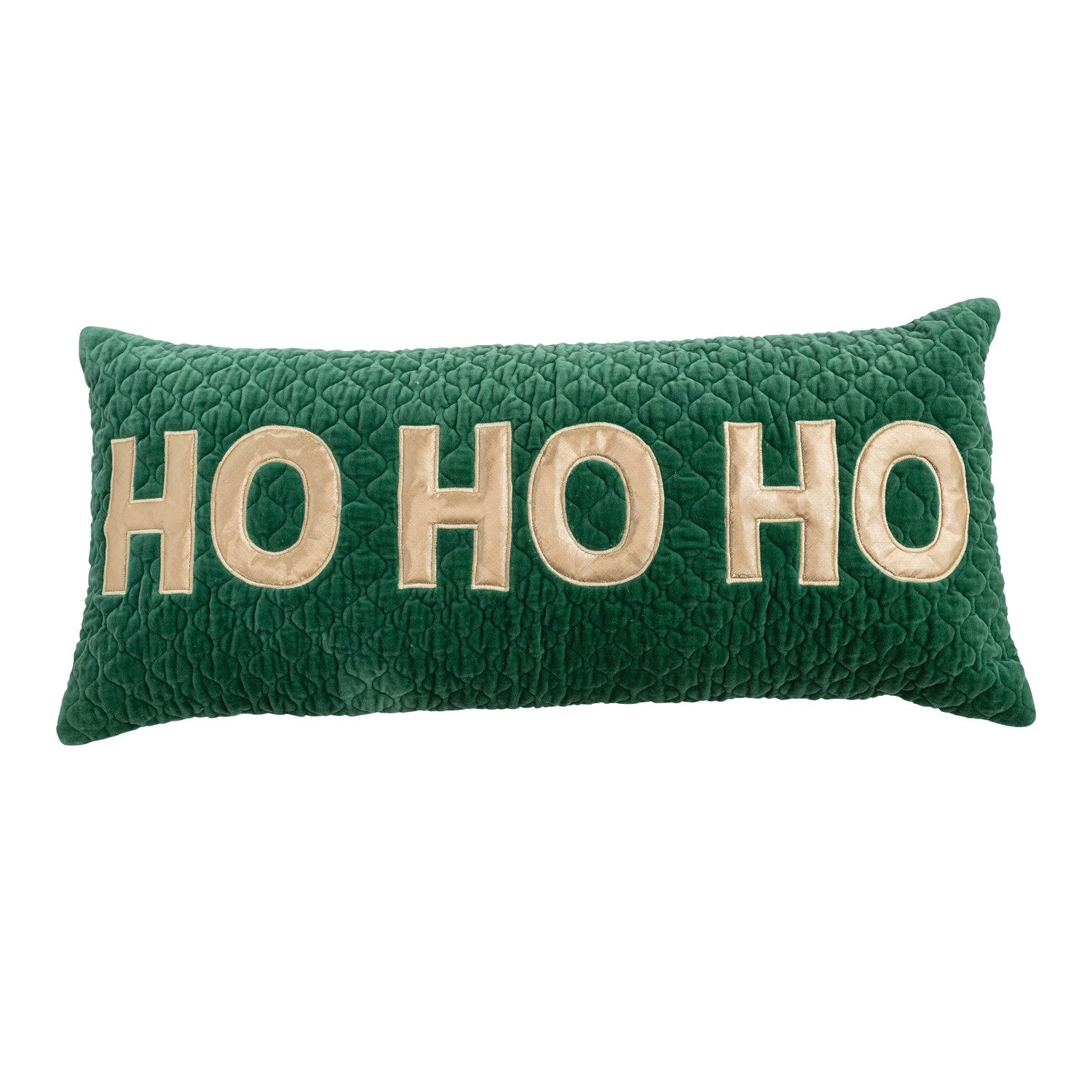 A green velvet decorative pillow with the text 'HO HO HO HO' embroidered in beige.