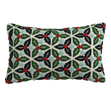 A rectangular lumbar pillow with a pattern of holly leaves and berries in green, red, and black colors.