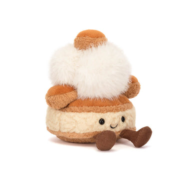 Plush toy resembling a marshmallow with brown and white colors on a white background