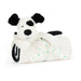 White plush dog toy with black spots and a bow on a white background