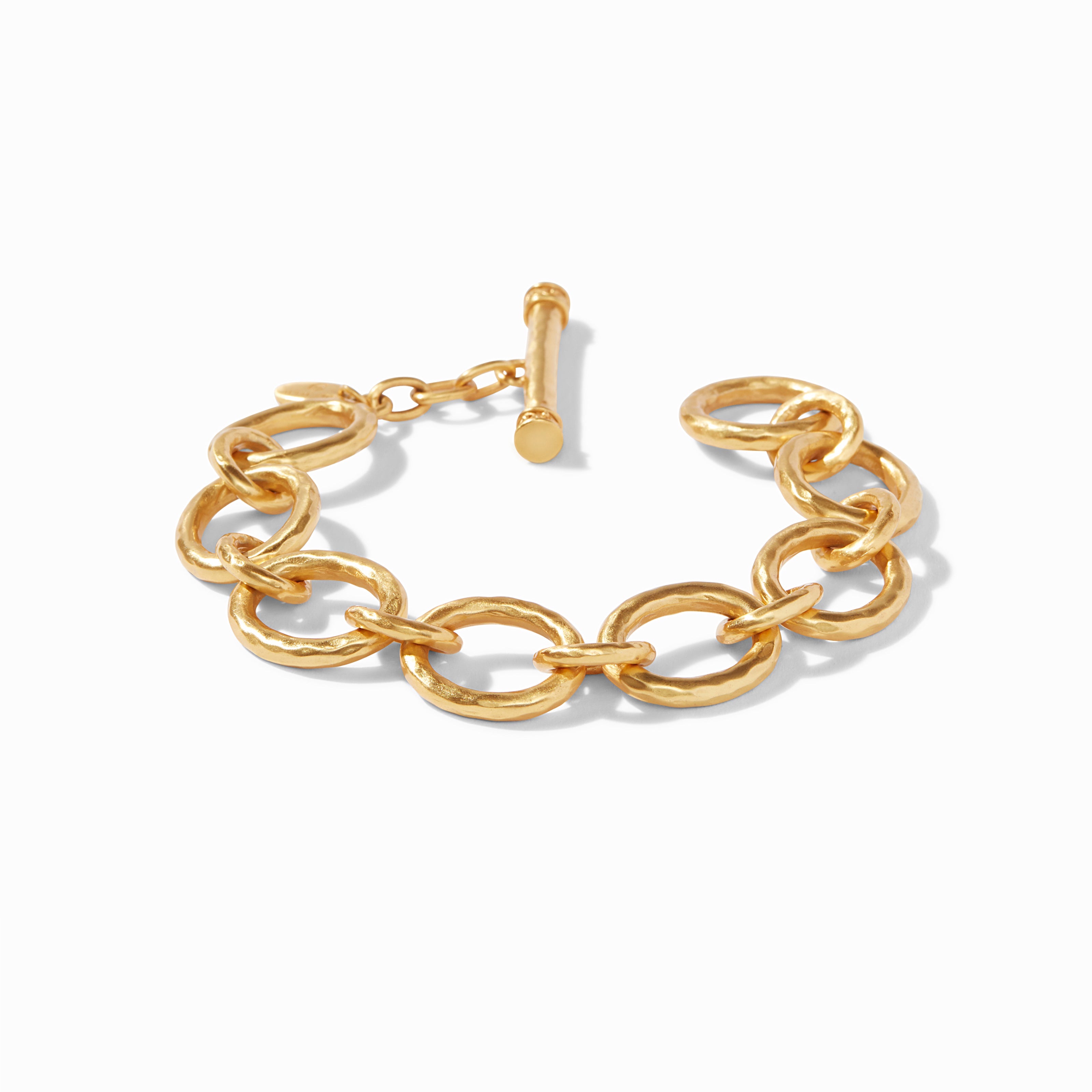 Gold chain bracelet on a white background