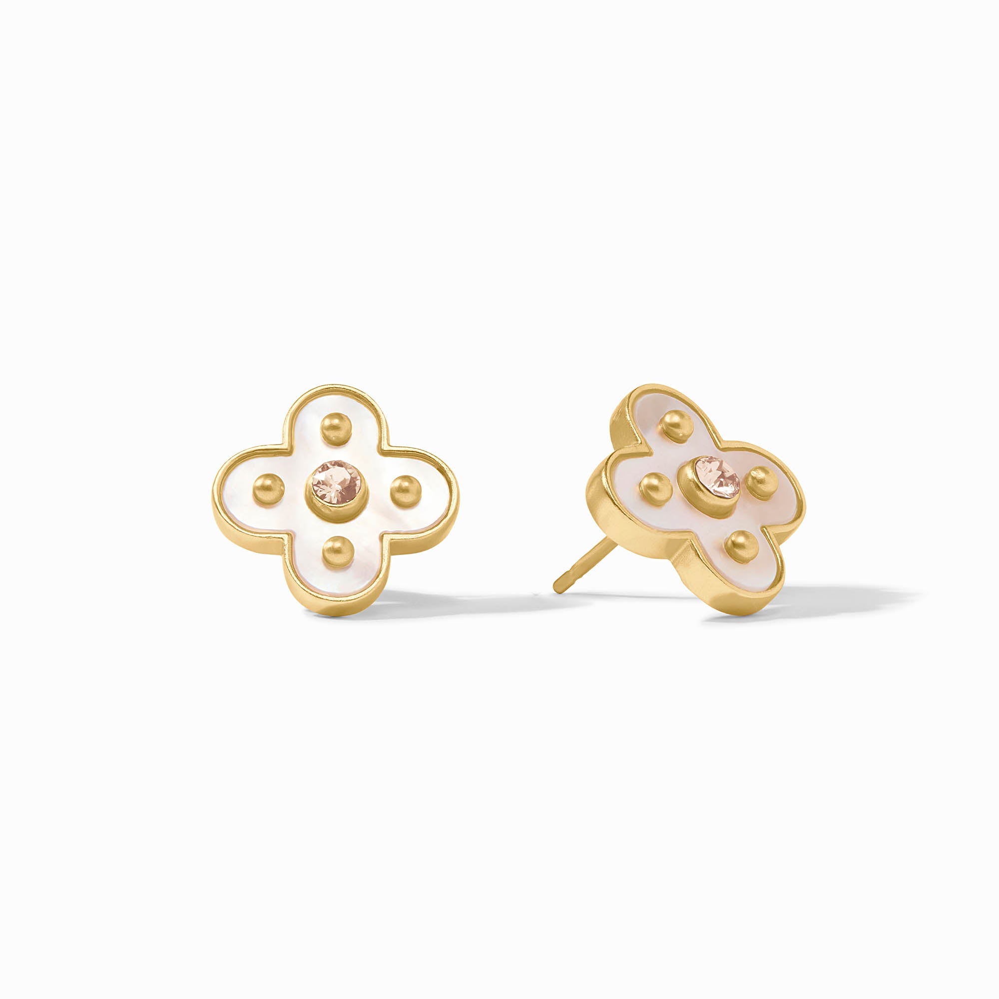 Gold and white floral earrings on a white background