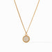 Gold necklace with a round pendant on a white background