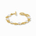 Gold bracelet with white stones on a white background
