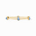 Gold bracelet with blue stones on a white background