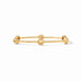 Gold ring with spherical beads on a white background