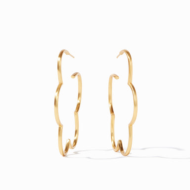 Gold hoop earrings on a white background