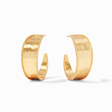 Gold hoop earrings on a white background