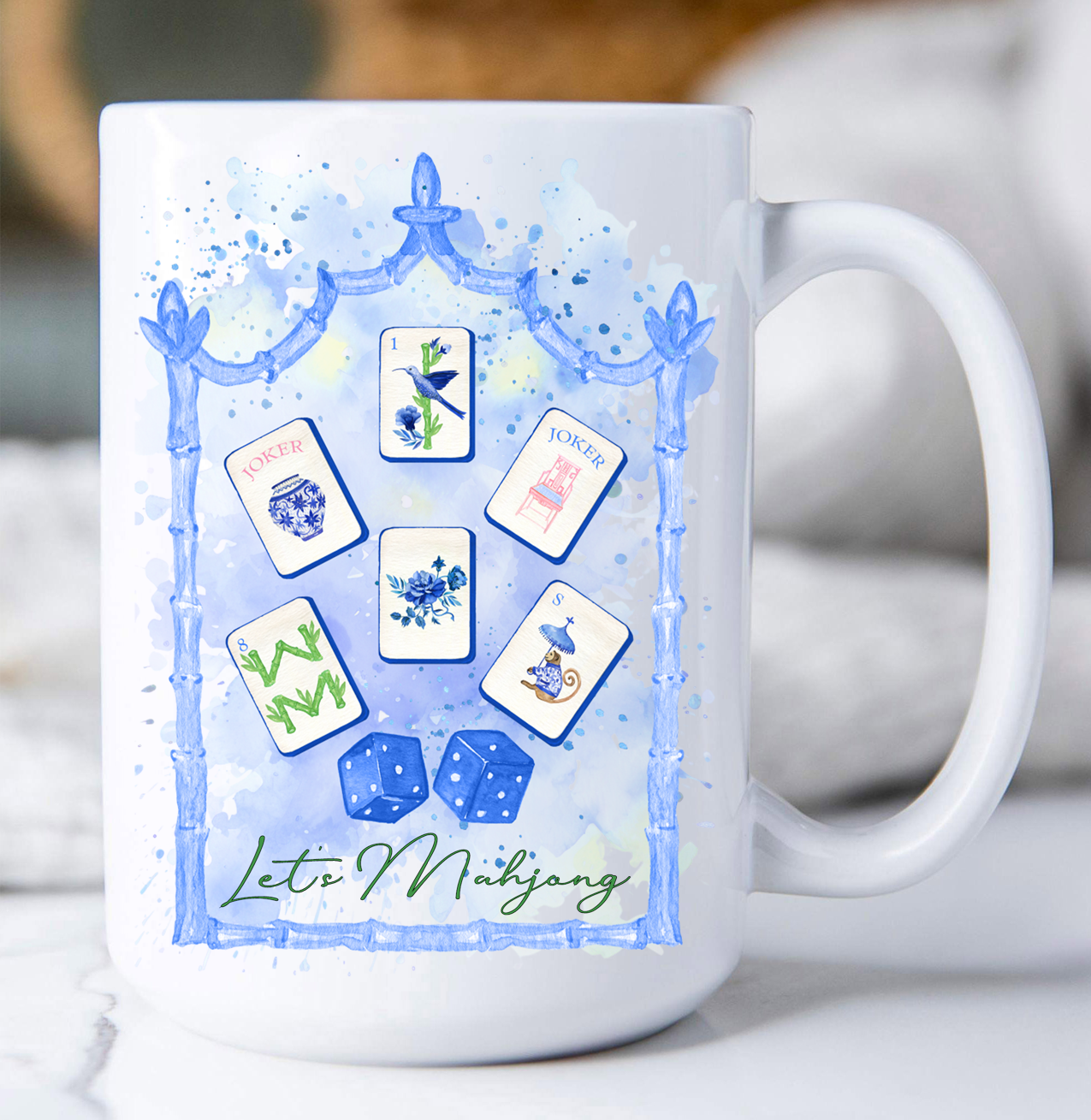 White mug with Mahjong-themed design featuring tiles and dice on a light background