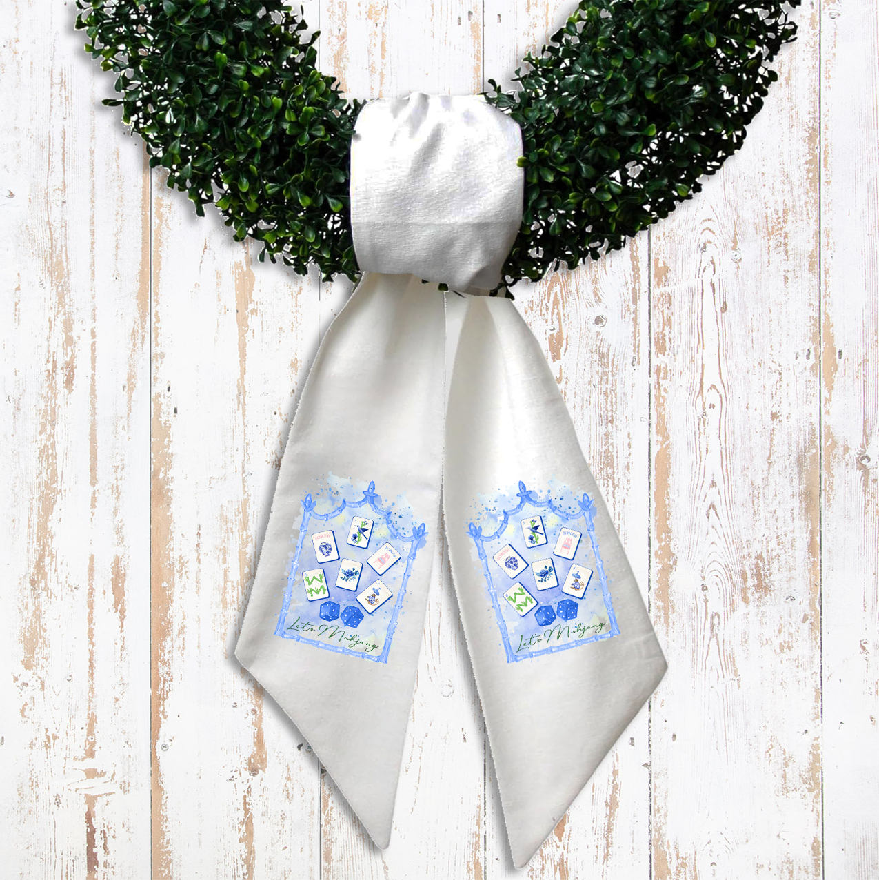 White ribbon with blue designs and text on a wooden surface