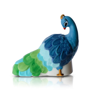 Colorful peacock figurine on a white background