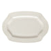 White ceramic platter with wavy edge on a white background
