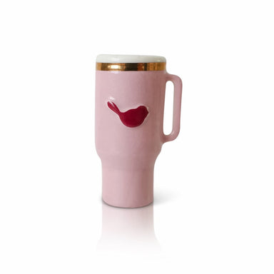 Pink travel mug with a red bird design on a white background