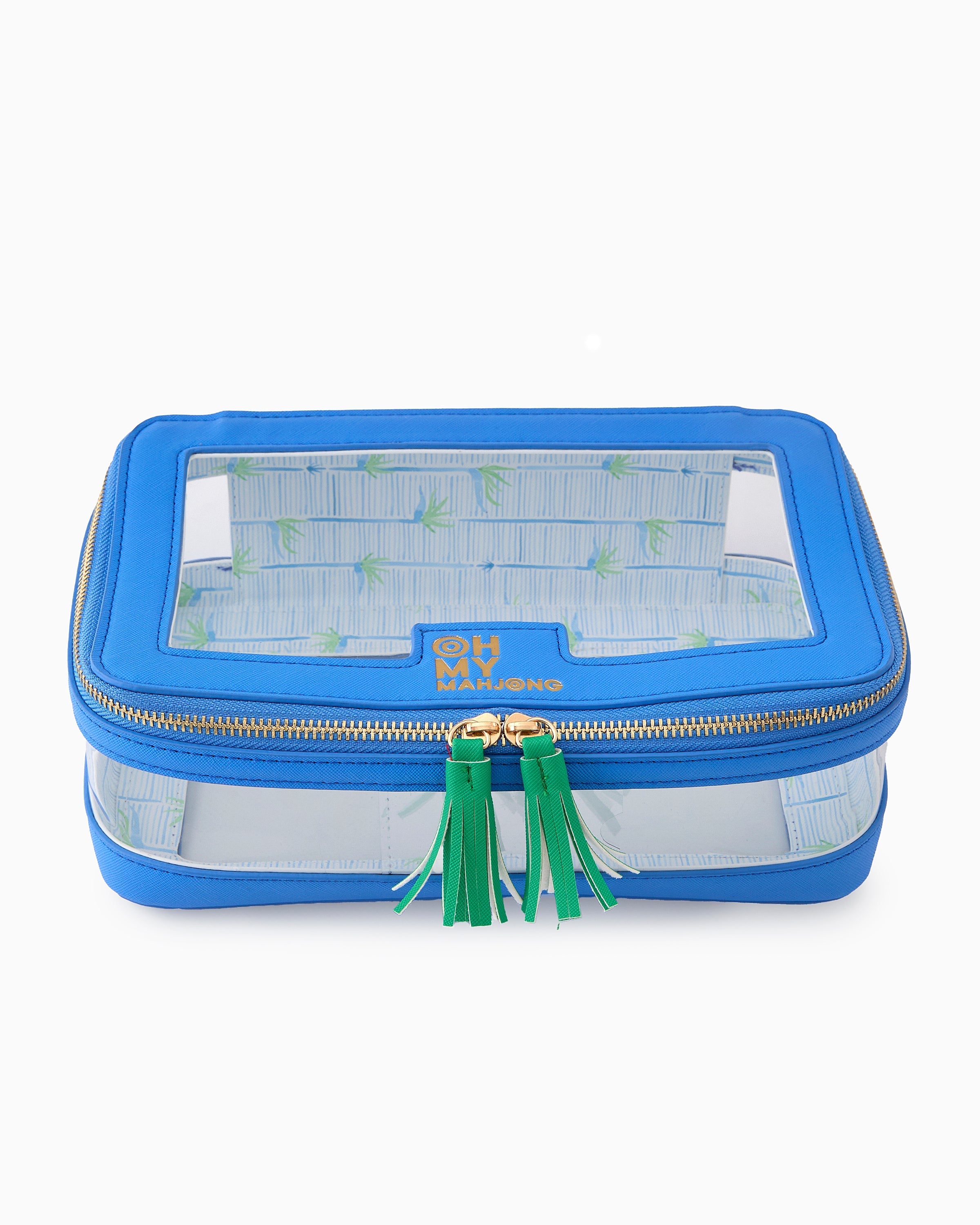 Blue travel pouch with green tassel on a white background