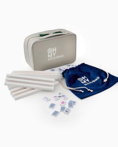 Oh My Mahjong game set with carrying case and dice on a white background